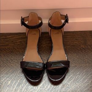 Black glossy open-toe heels